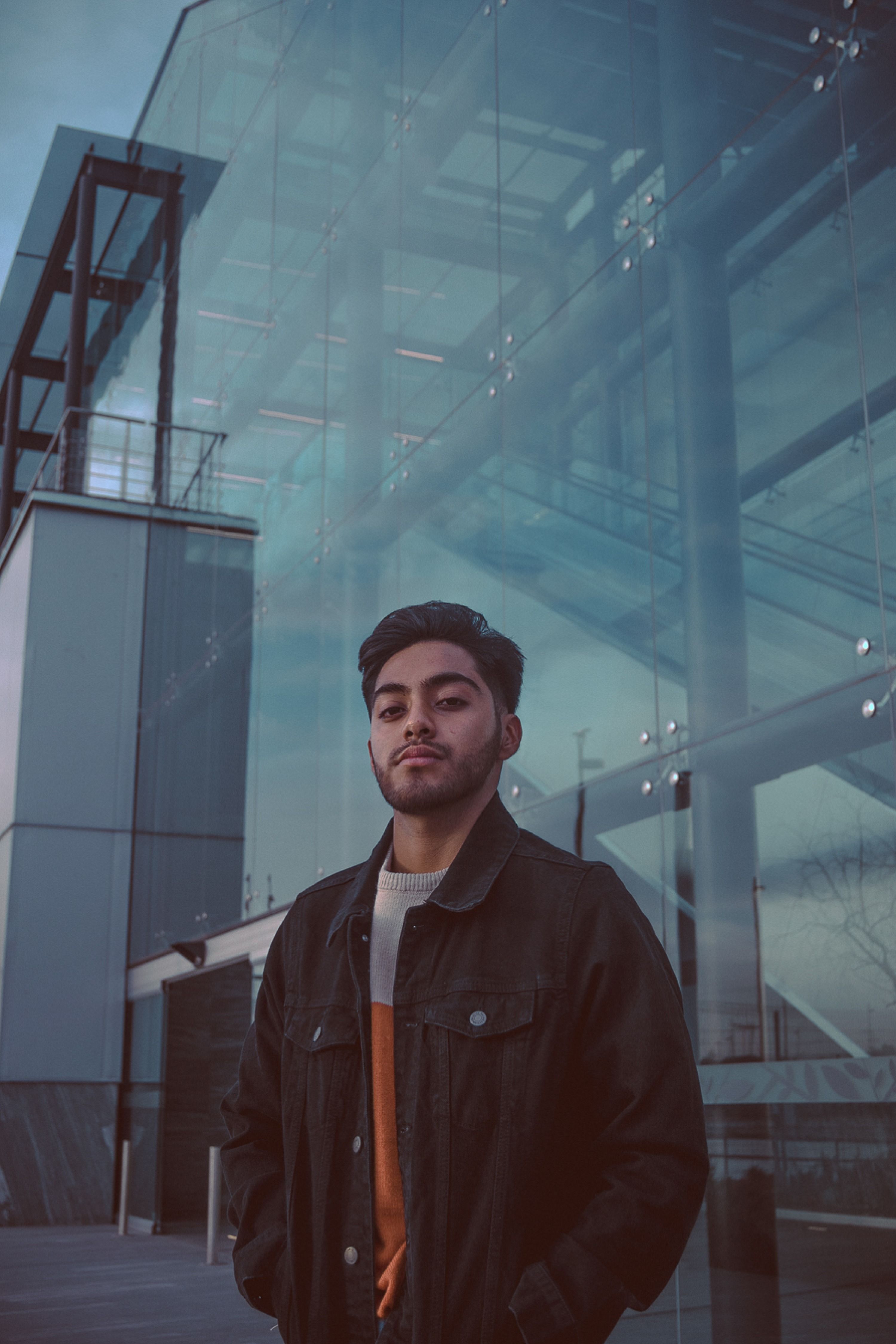Urban Portrait of a Young Man with Modern Architecture · Free Stock Photo