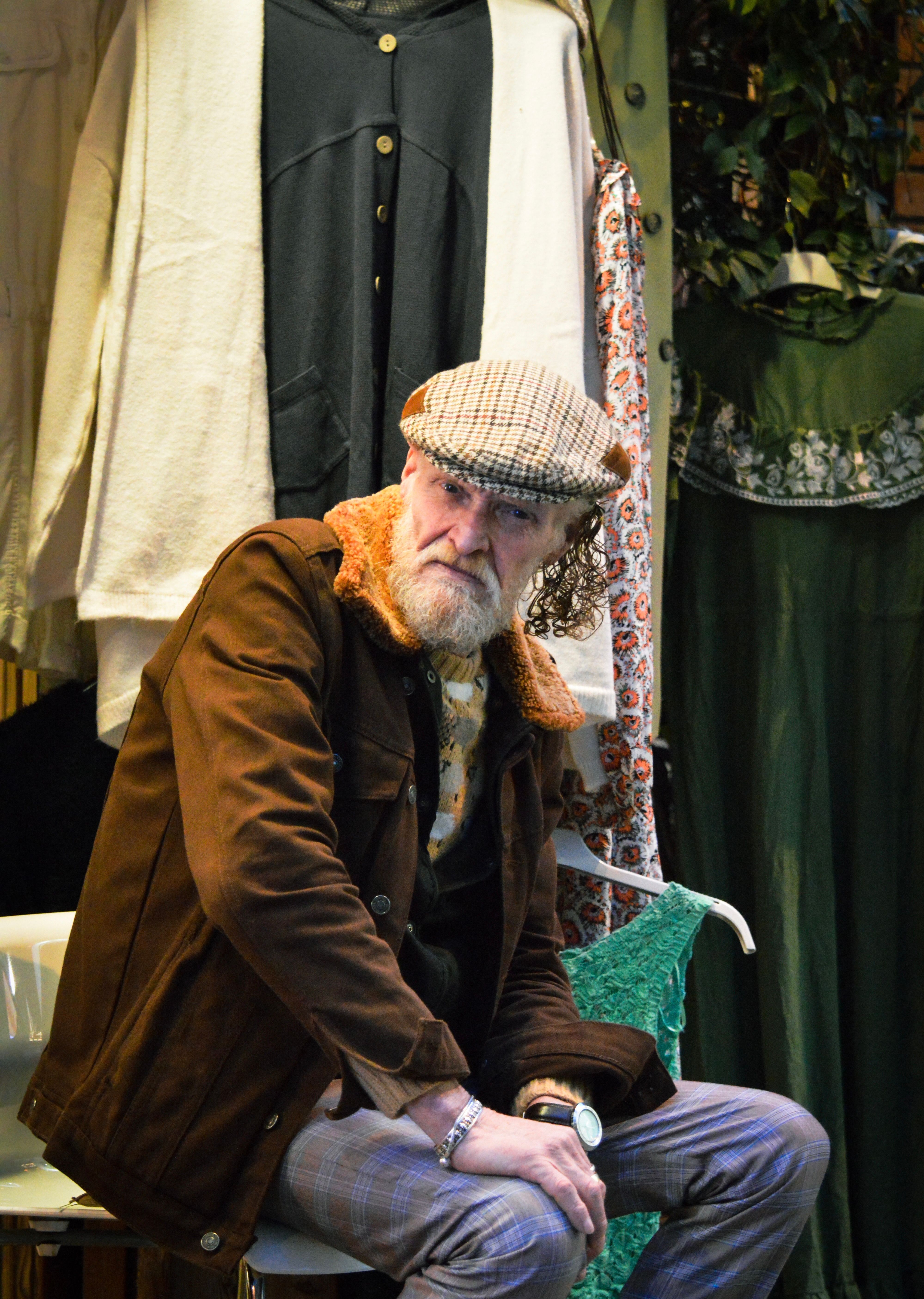 Elderly man in vintage clothing shop · Free Stock Photo