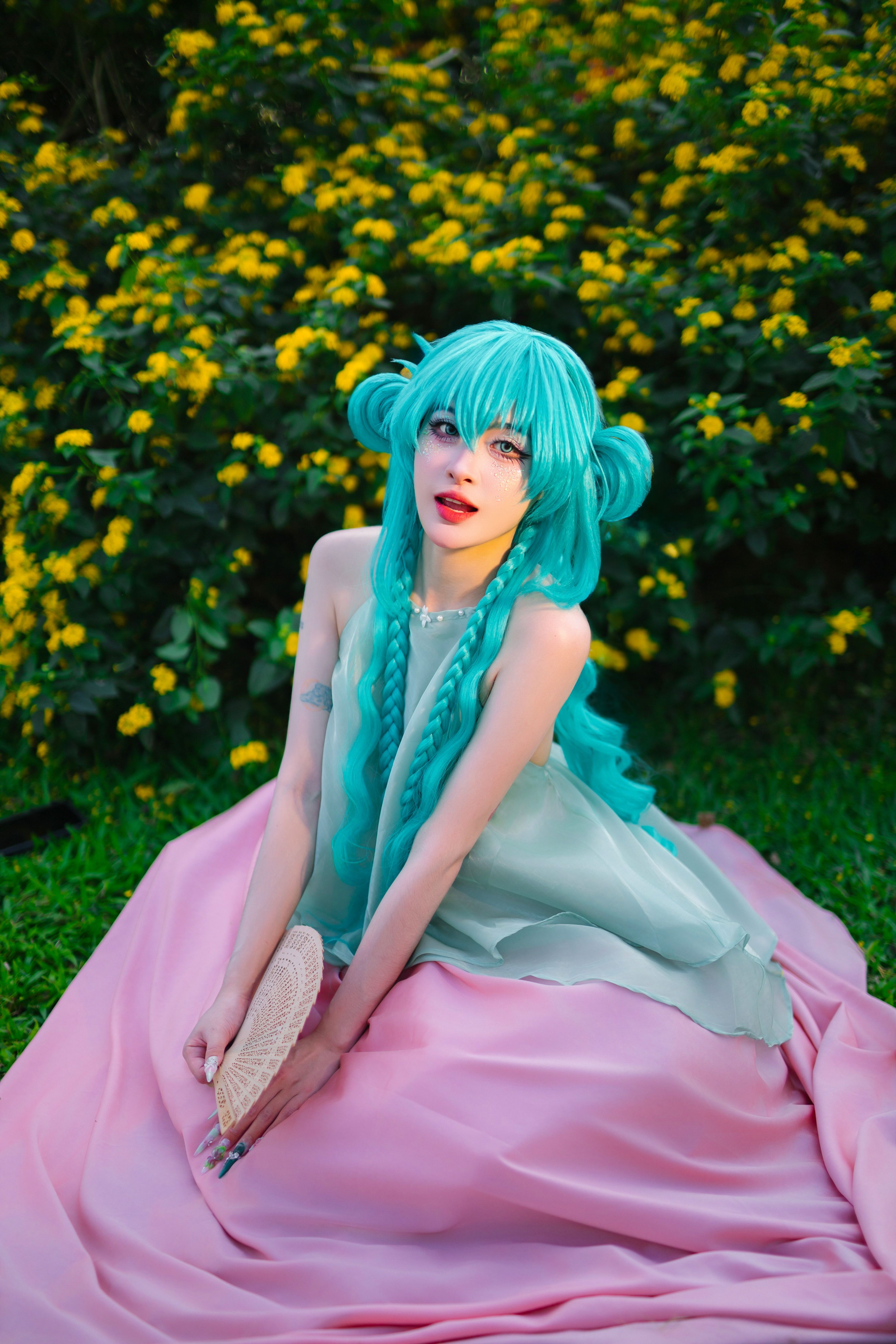 Enchanting Cosplay in Vibrant Garden Setting · Free Stock Photo