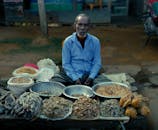 Bangladeshi Vendor Selling Dried Fish at Market