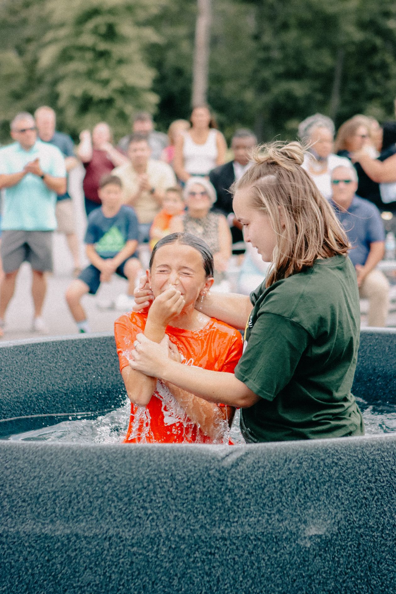 An outdoor baptism celebration
