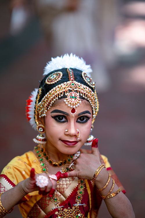 Free Young girl performing classical dance in vibrant attire, Kerala. Stock Photo