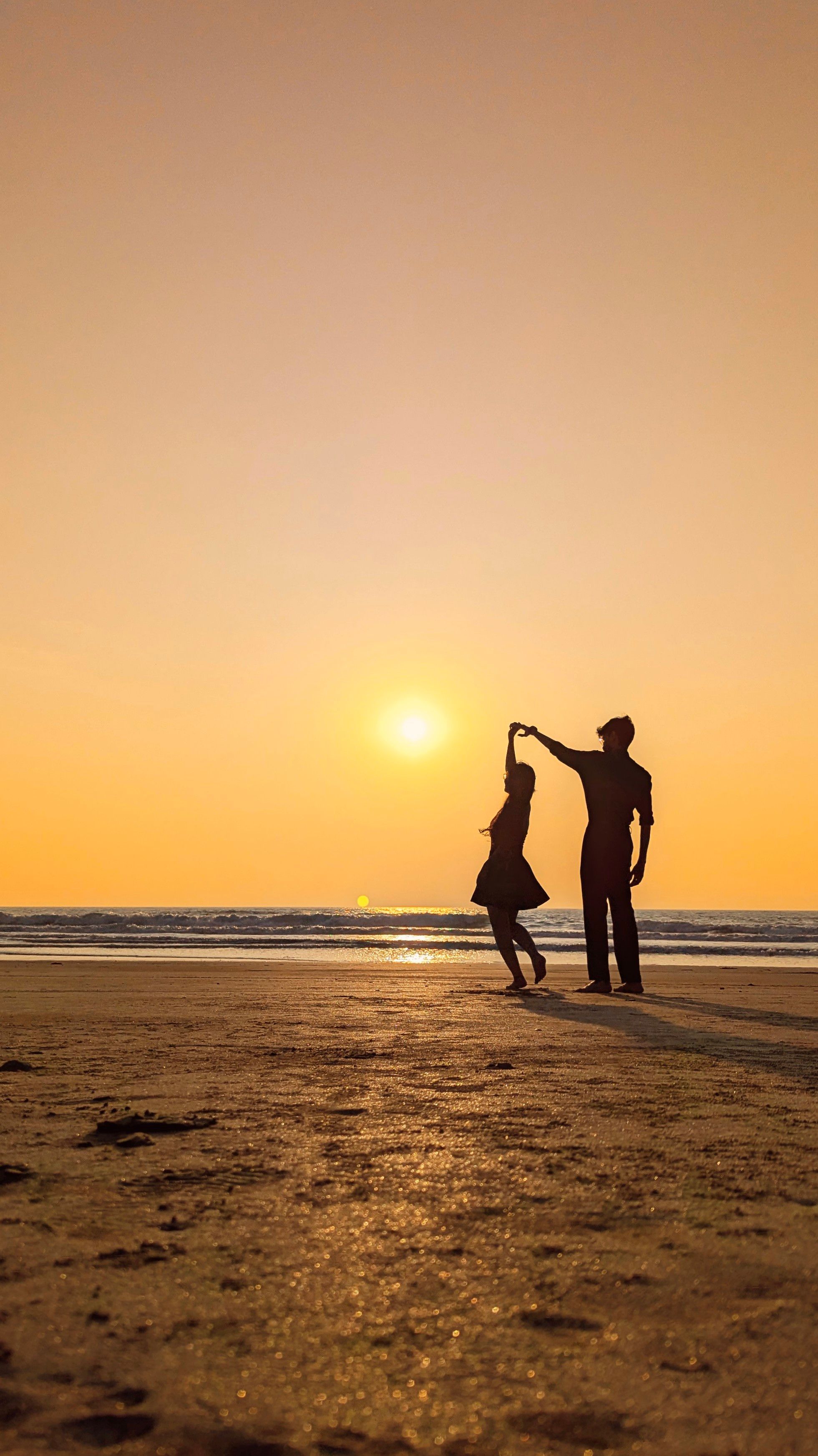 Silhouette of Couple Dancing at Sunset on Beach · Free Stock Photo