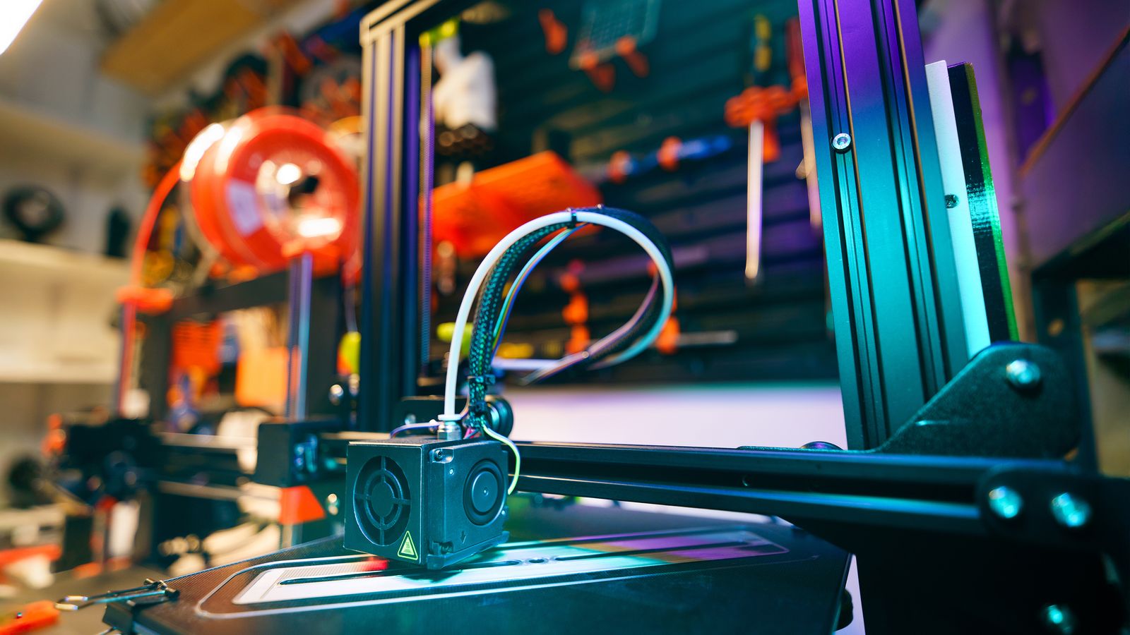 FDM 3D printer running a job in a modern workshop