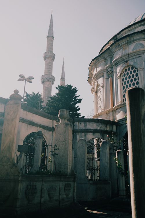 Free Sunlit minarets and architecture of a historic mosque in Istanbul, Turkey. Stock Photo