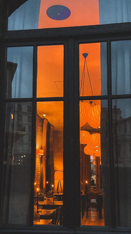 Warm Interior View of Tallinn Restaurant at Night · Free Stock Photo