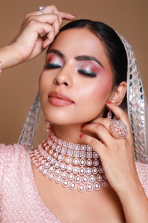 Free Beautiful Indian bride with elegant jewelry and makeup, showcasing cultural bridal elegance. Stock Photo