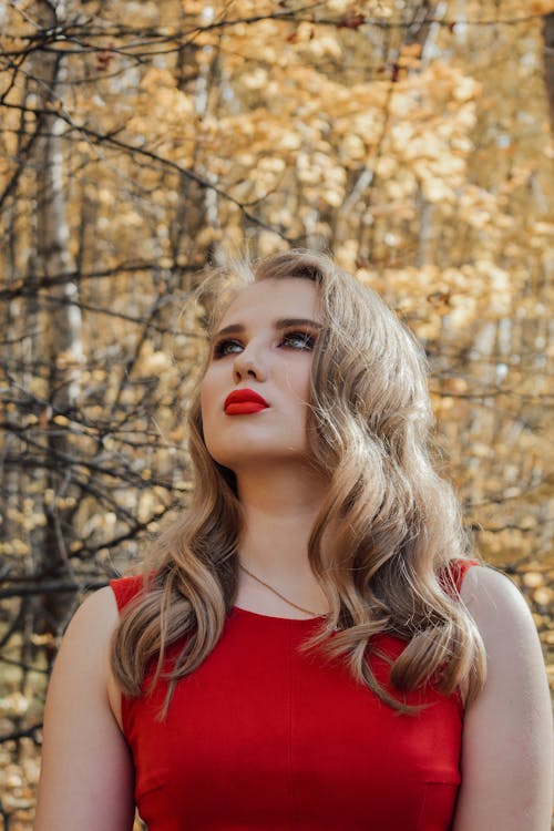 Photo Of Woman Wearing Red Tank Top