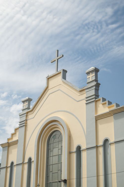 Free Elegant church facade against a bright sky captured in Arabutã, SC, Brazil. Stock Photo