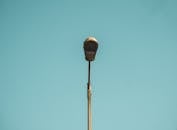 Minimalist Street Lamp Against Blue Sky