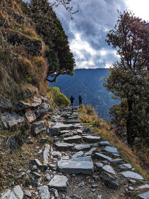 Free Explore a rocky mountain path overlooking lush valleys in Dharamshala, India. Stock Photo