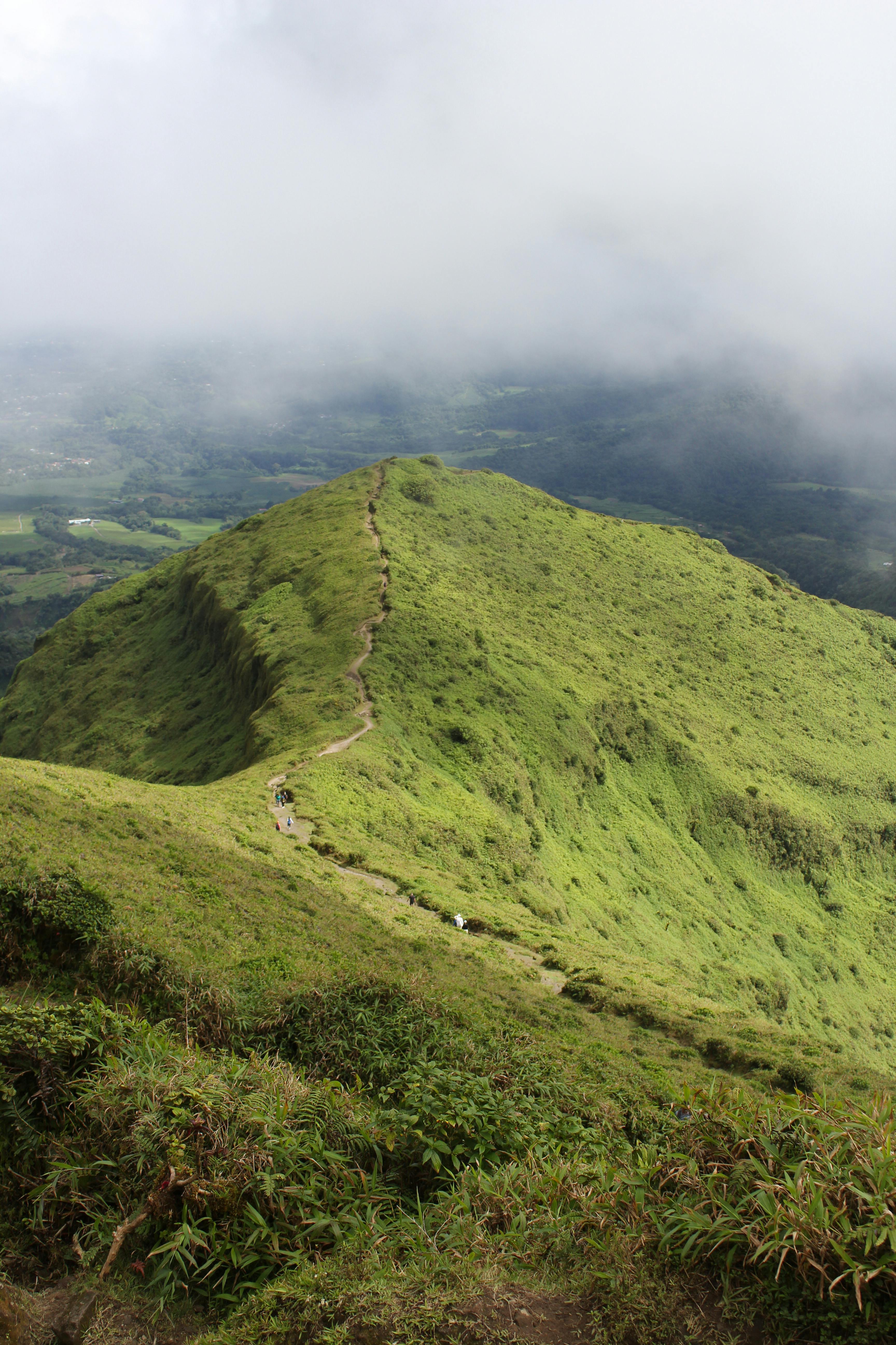 Explore the lush green mountain landscapes of Martinique, perfect for nature lovers.