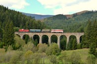 Train Crossing Historic Viaduct in Telgárt, Slovakia
