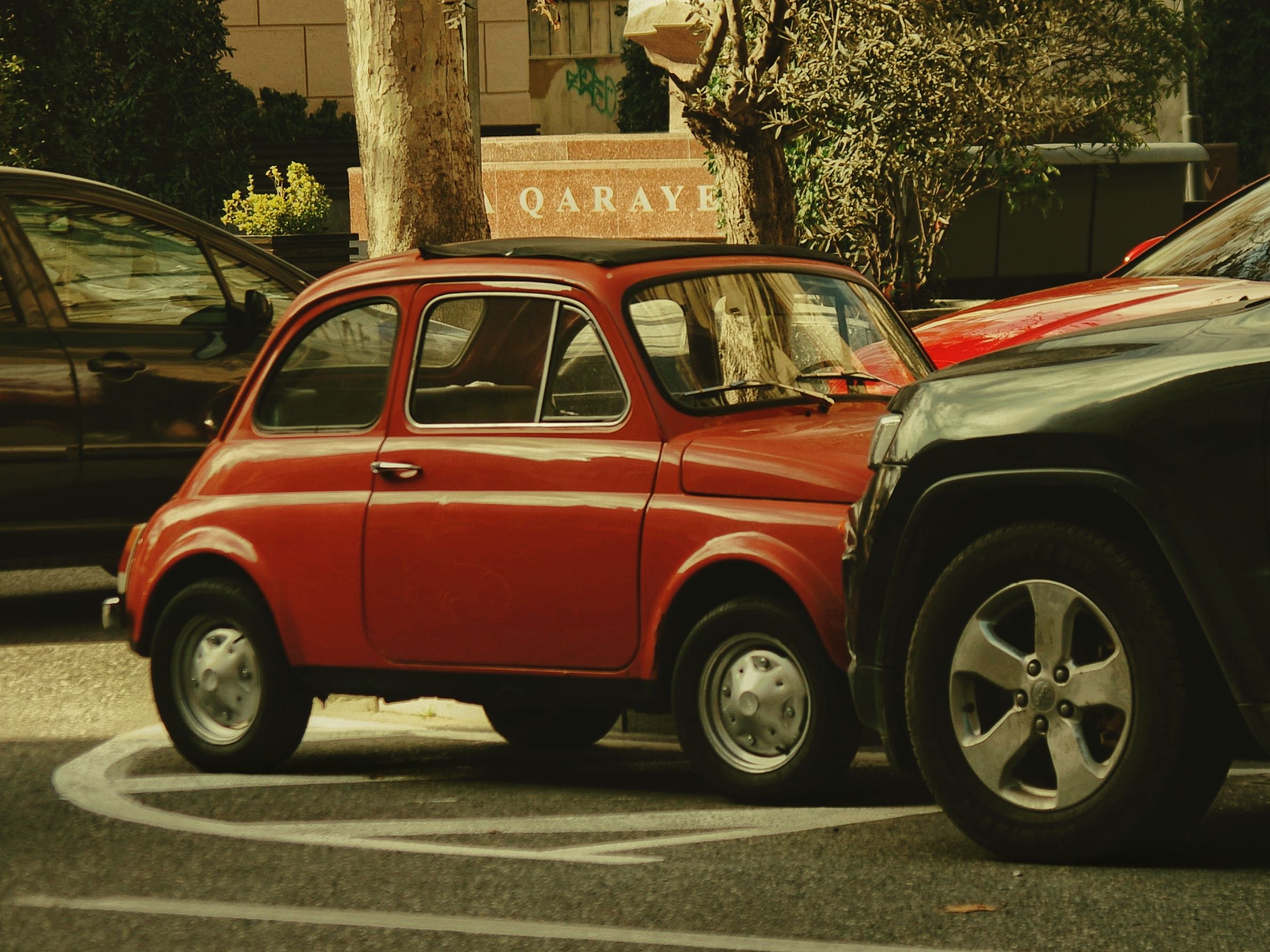Classic Red Vintage Car Parked on City Street · Free Stock Photo
