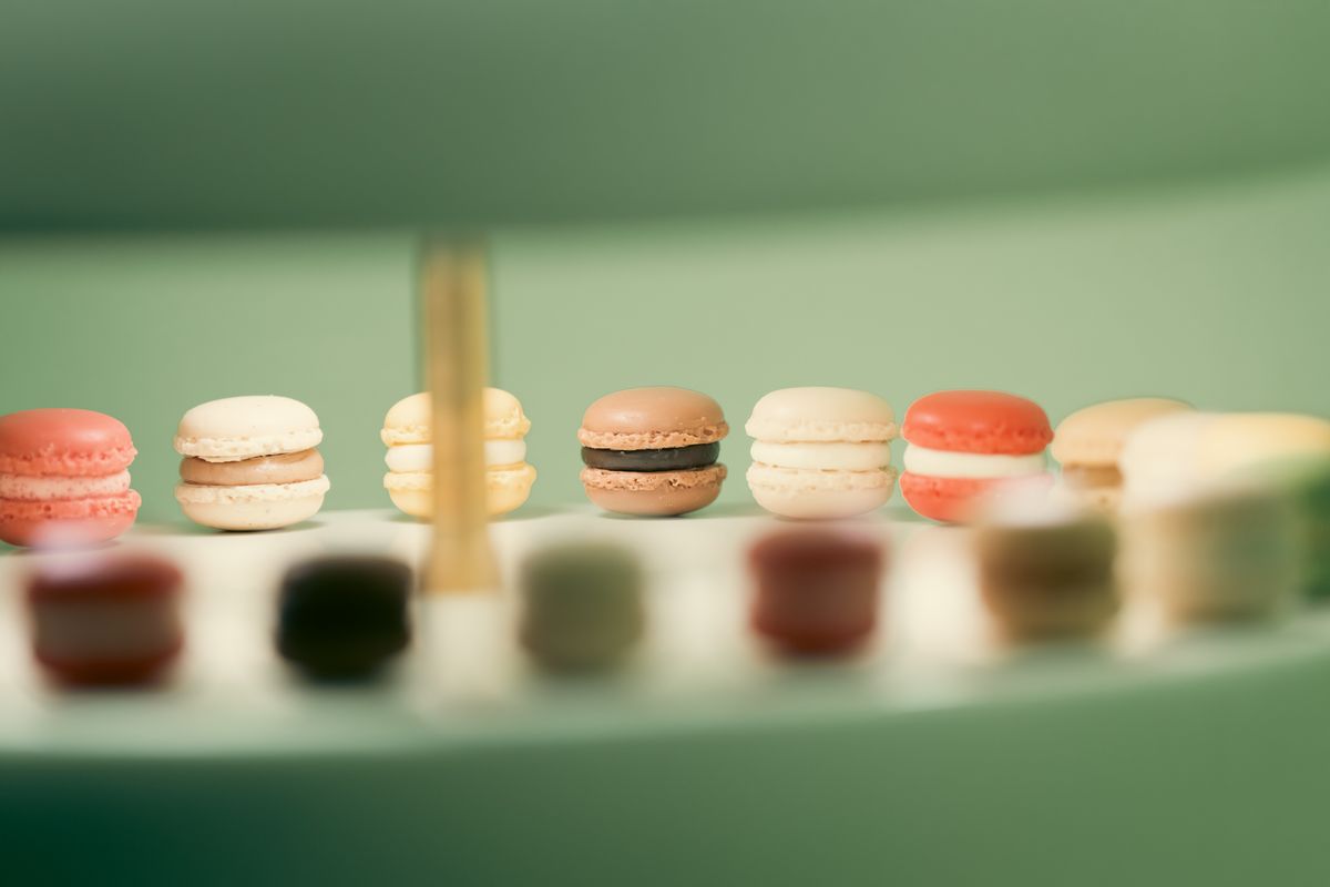 Pastel macarons arranged on a display stand