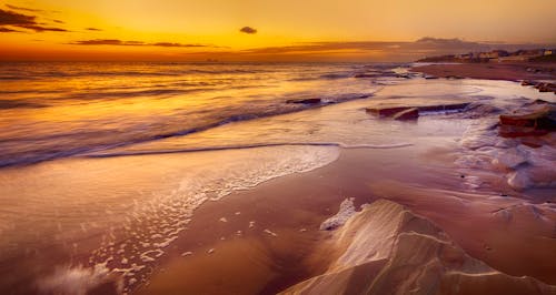 Free Photography Of Seashore During Golden Hour Stock Photo