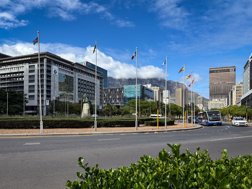 Ride-sharing car on a busy street in a South African city like Johannesburg