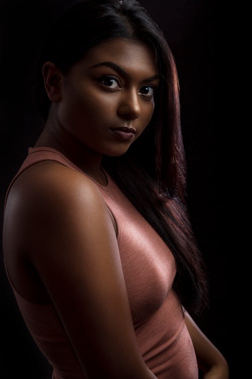 Woman Wearing Pink Sleeveless Dress