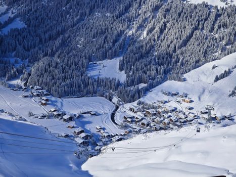 Scenic winter view of snow-covered Lech am Arlberg, Austria in the Austrian Alps.