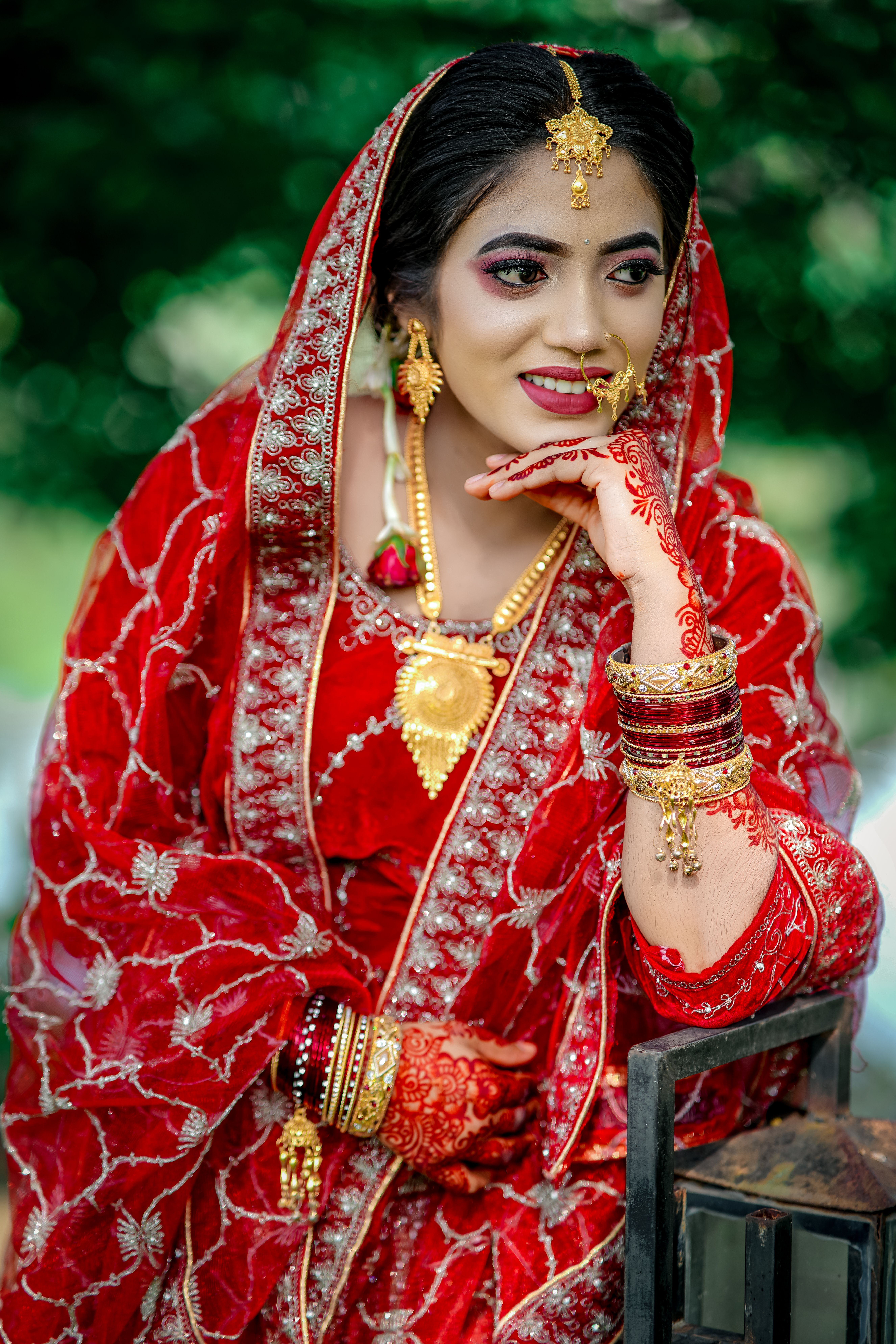Beautiful Bride in Traditional Red Attire Outdoors · Free Stock Photo