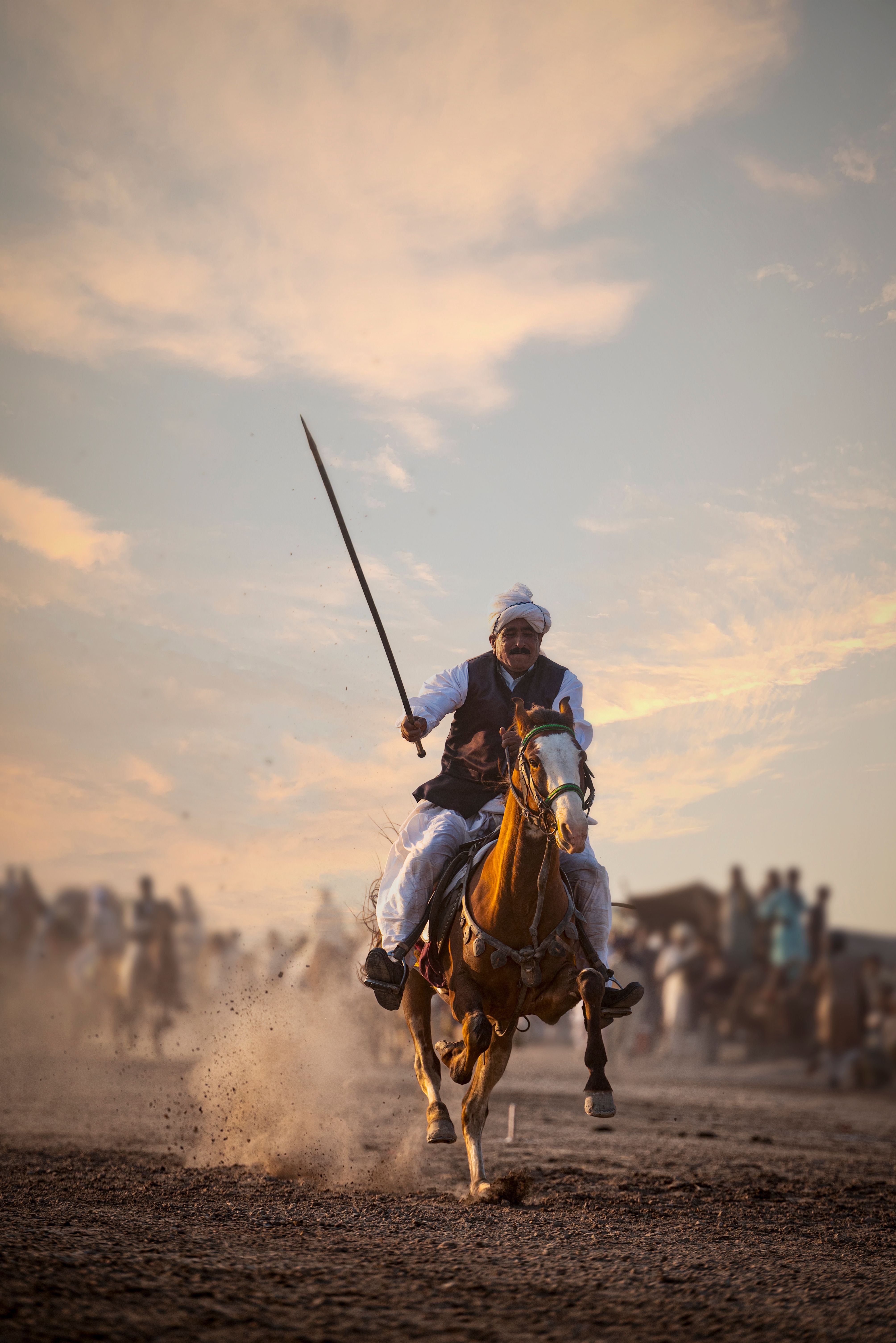 Traditional Horseback Rider in Action at Sunset · Free Stock Photo