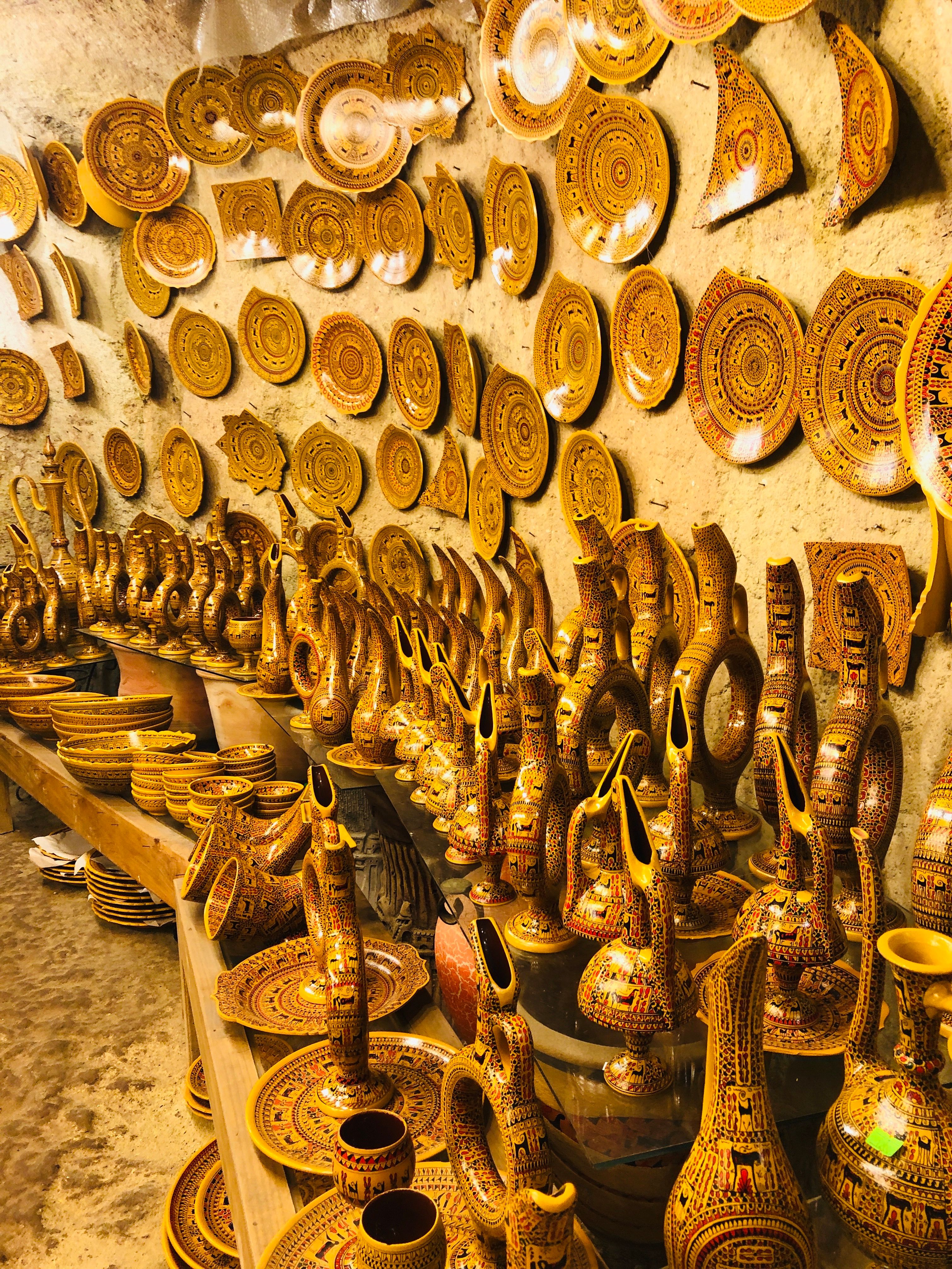 Traditional Handcrafted Pottery Display in Shop · Free Stock Photo
