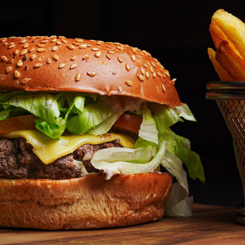 Budget Beef Burgers with Colby Jack and Crispy Shoestring Fries Topping