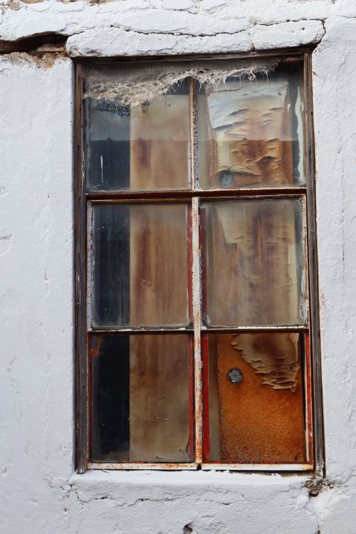 Free Old rustic window with peeling paint in İzmir, Türkiye, captures a historic look. Stock Photo