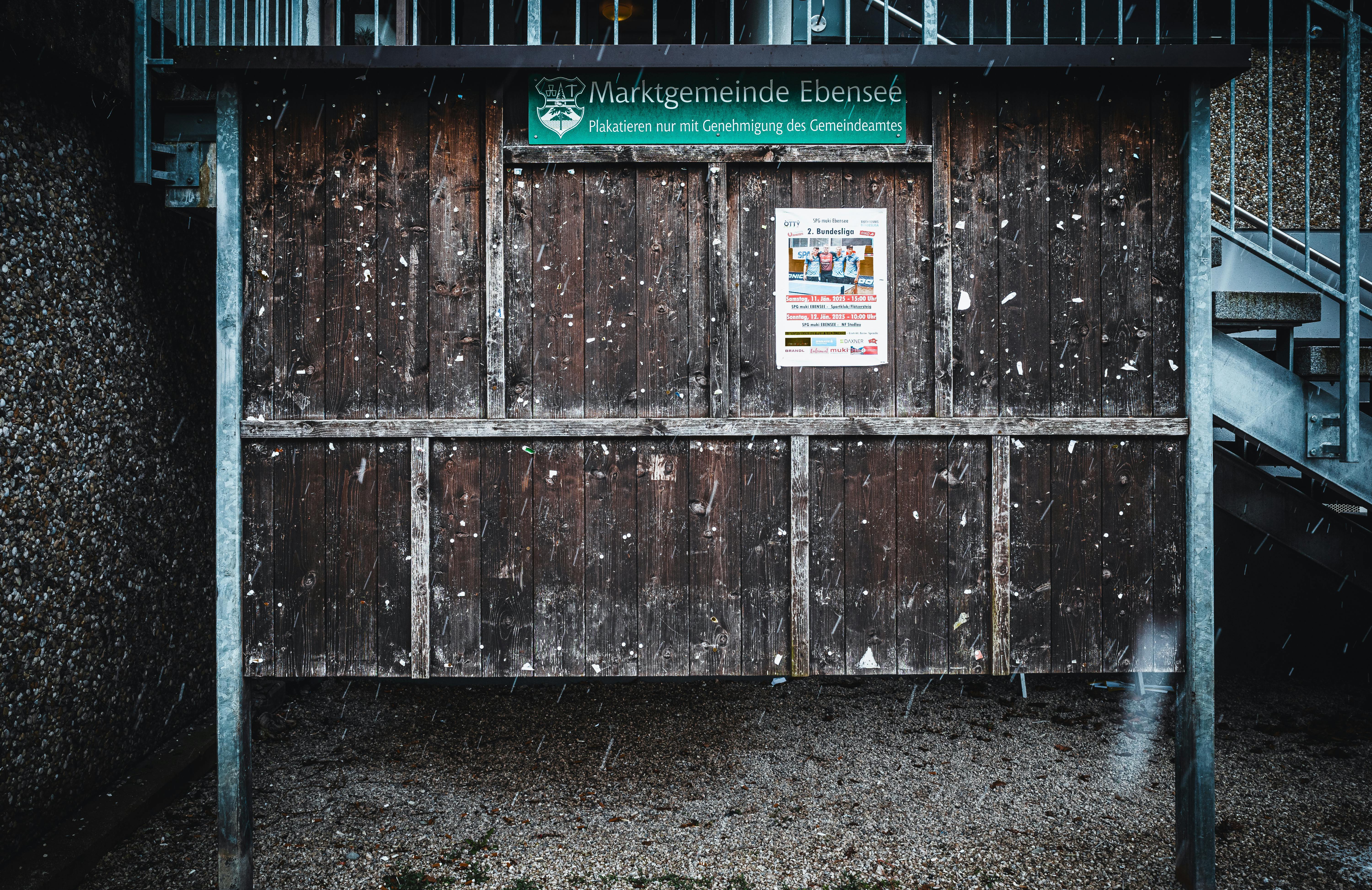 Weathered wooden bulletin board with posters in Ebensee, Austria. - 7 Best cheap Personal Finance Tips strategy near me for busy locals