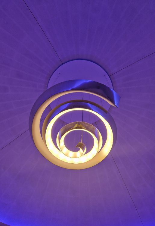 Modern Spiral Ceiling Lighting Fixture Indoors · Free Stock Photo