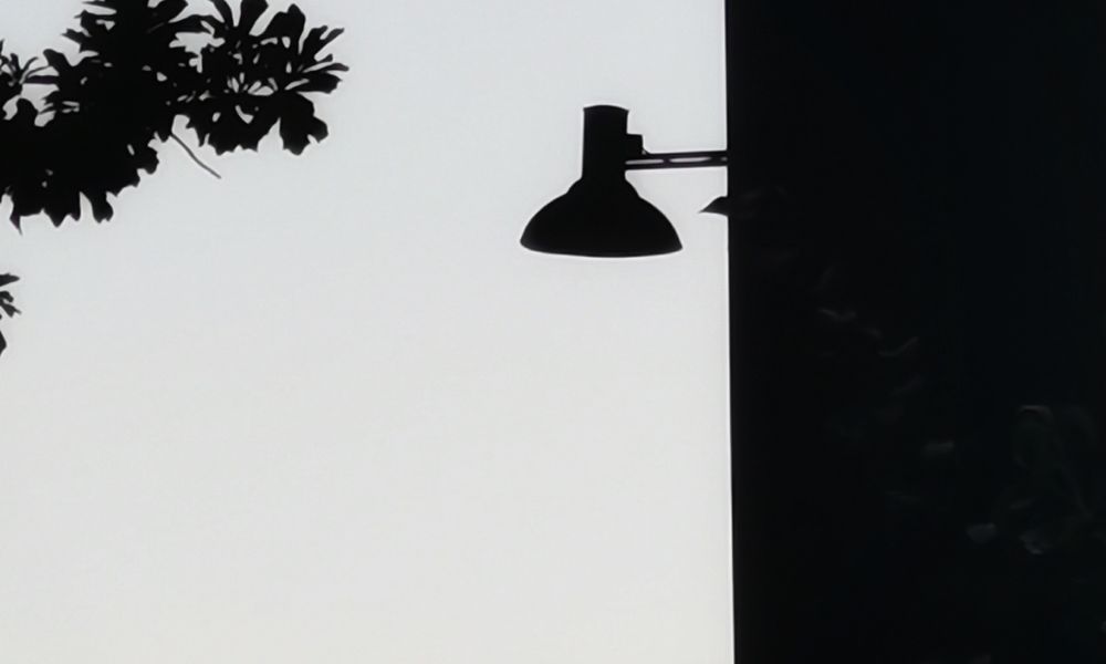 Silhouette of a couple facing a vivid sunset, representing using a Destiny Matrix twin flame reading as a conversation rather than a verdict