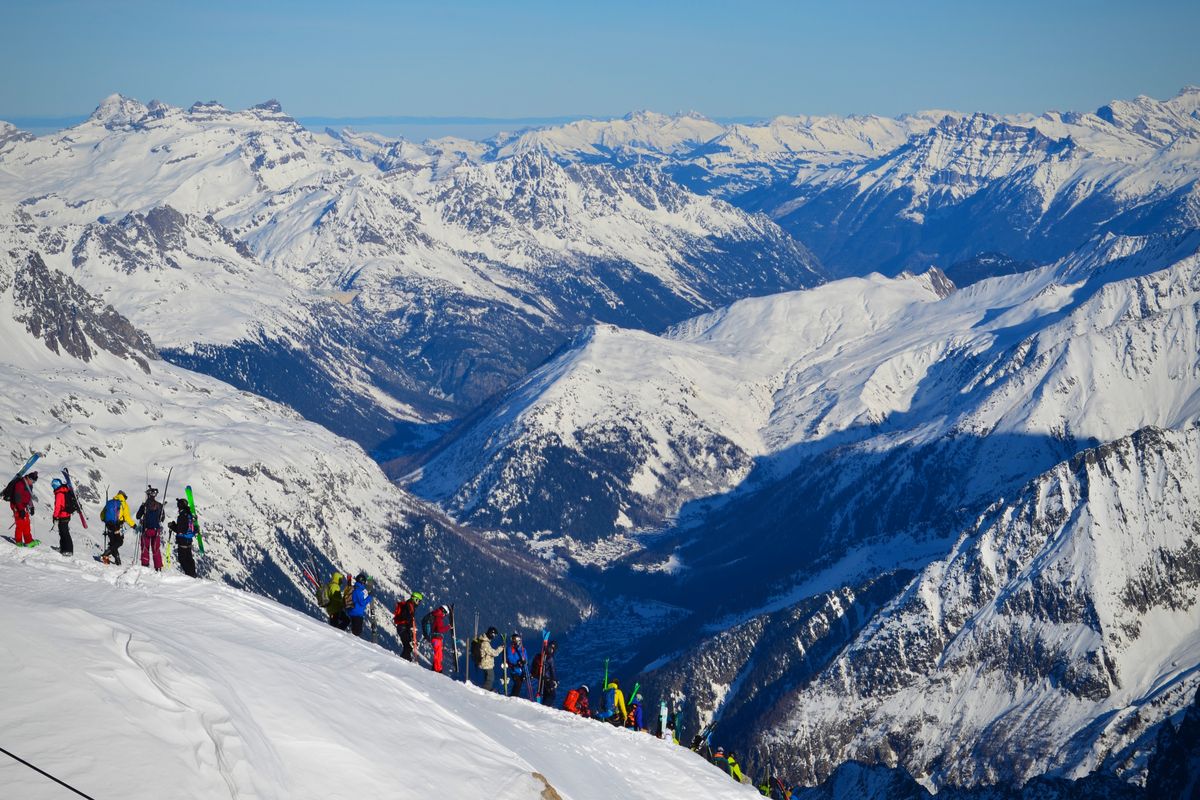 Sunny intermediate ski slopes overlooking the Mont Blanc massif