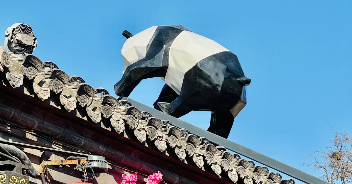 Panda Sculpture on Traditional Chinese Roof · Free Stock Photo