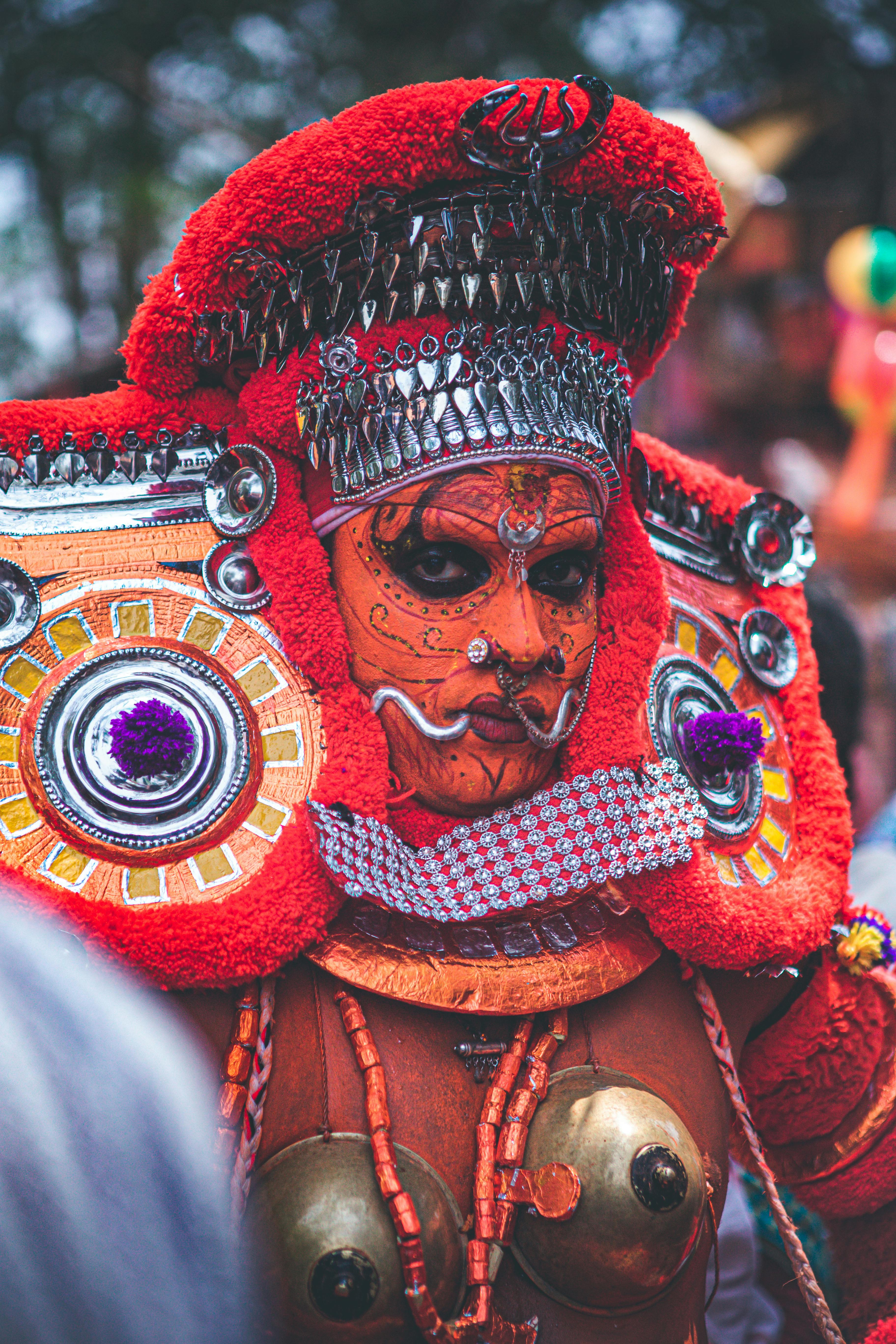 Traditional Theyyam dancer in colorful costume