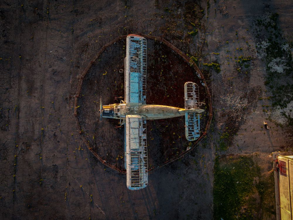 Aerial View of Abandoned Airplane on Runway · Free Stock Photo