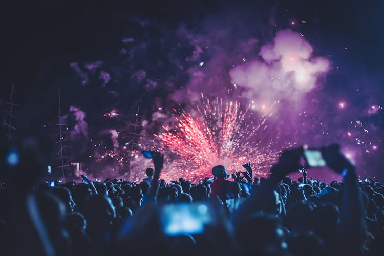 Crowd Of People Enjoying On Concert