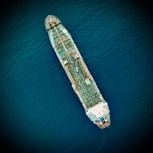 Free A top-down aerial shot of a cargo ship in the blue waters of Acapulco Bay, Mexico. Stock Photo