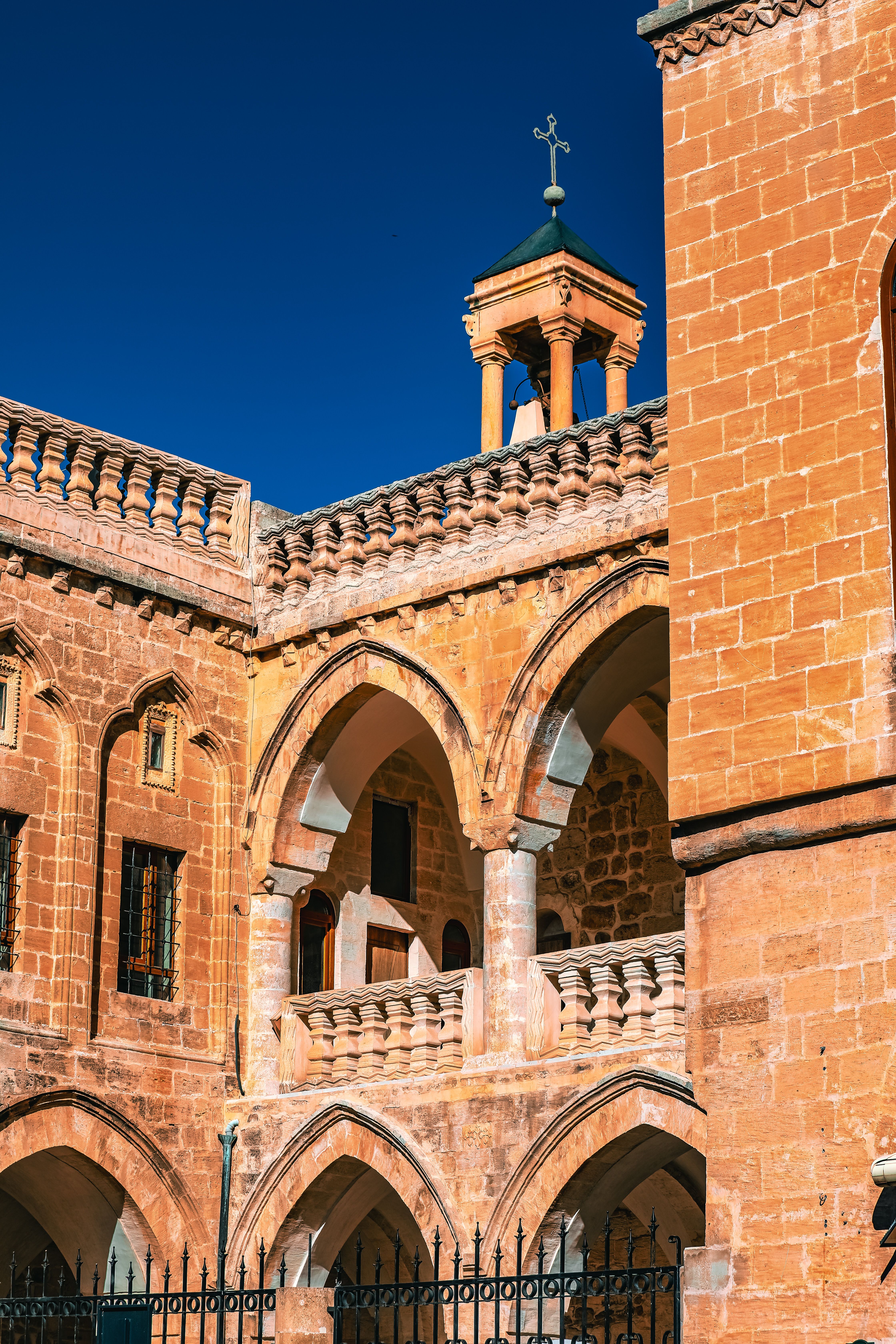 Intricate stone architecture of a historic church in Mardin, Turkey.