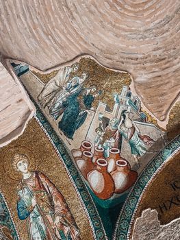 Detailed byzantine mosaic depicting religious scenes in an Istanbul church.
