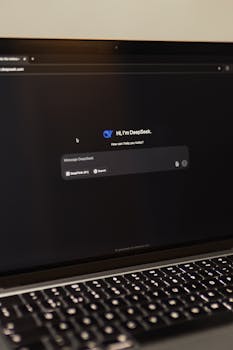Image of a laptop showing an interactive AI interface with DeepSeek application.