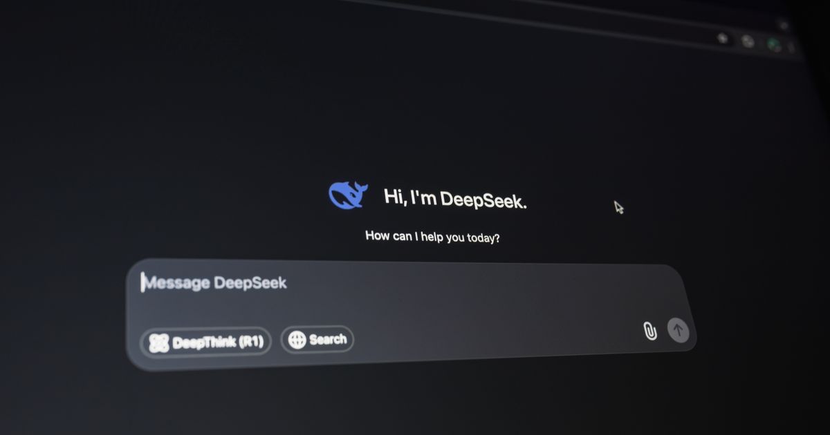 Close-up of a digital assistant chat interface glowing on a dark screen