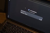 Laptop Displaying AI Chat Interface at Night