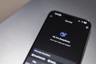 Smartphone Displaying AI Chatbot Interface