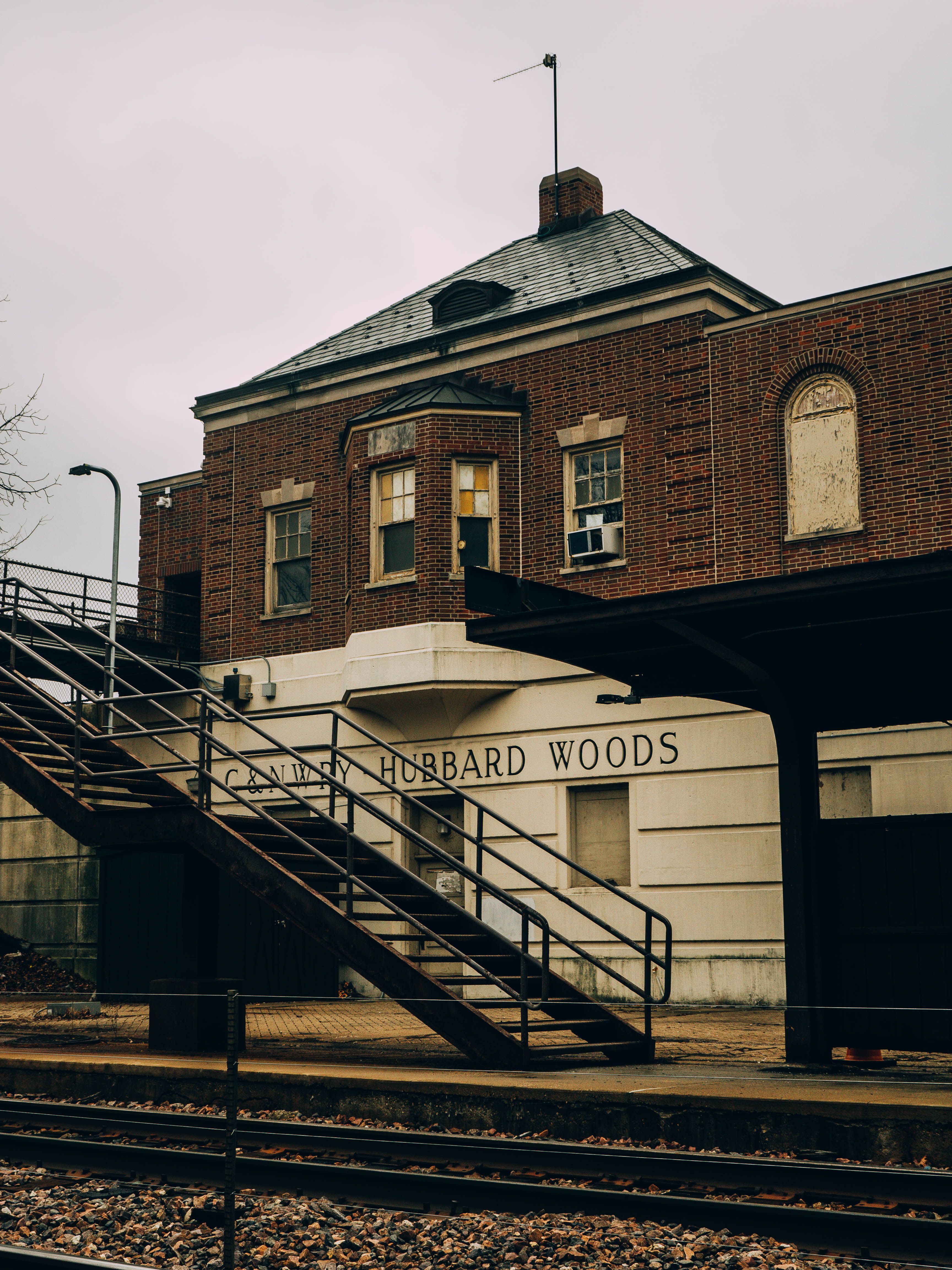 A vintage view of the Hubbard Woods train station with classic brick architecture.