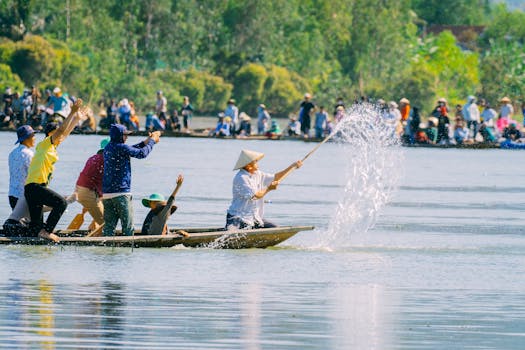 A vibrant scene of a traditional boat festival in Bình Định, Vietnam.