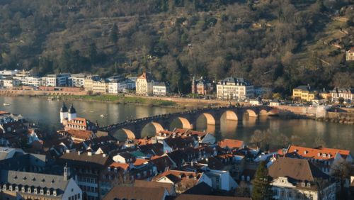 Free Aerial view of Heidelberg's historic Old Bridge over the Neckar River in Germany. Stock Photo