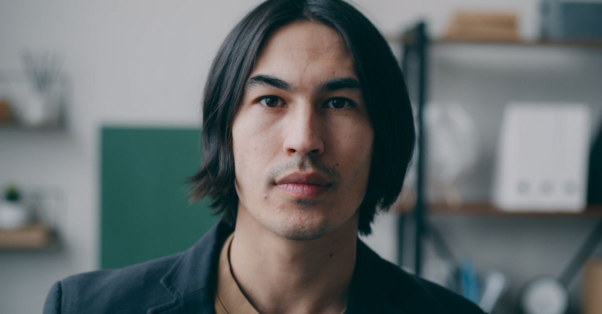 Close-up Portrait of a Thoughtful Adult Man · Free Stock Photo