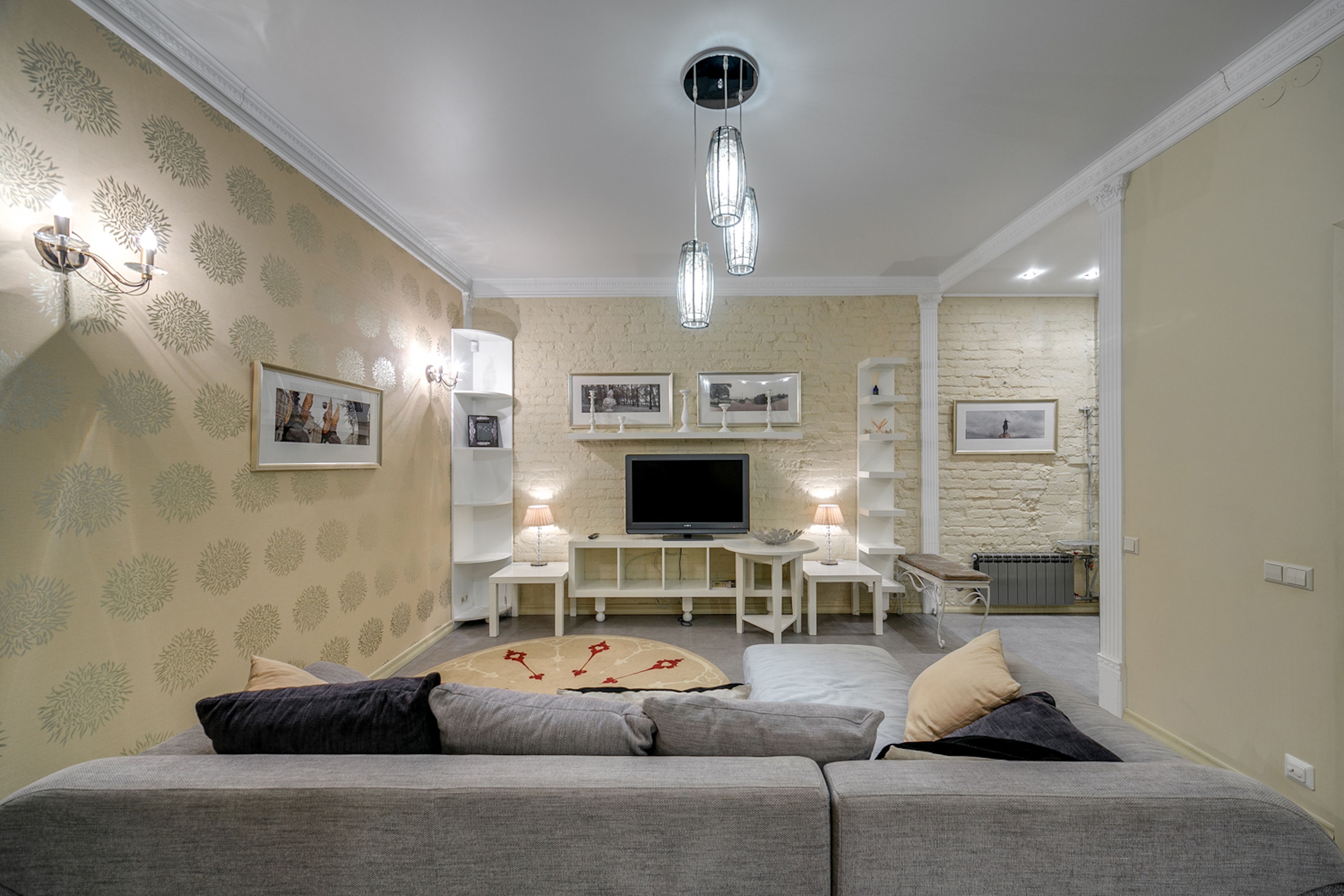 Elegant living room featuring modern decor, neutral tones, and ambient lighting.