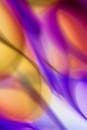 Vibrant Abstract Waves in Purple and Gold