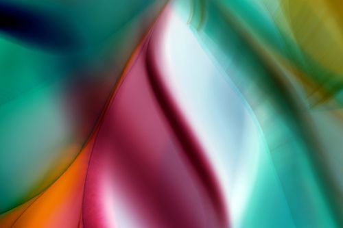 Free Colorful abstract waves creating a vibrant, fluid pattern. An artistic display of curves and flow. Stock Photo